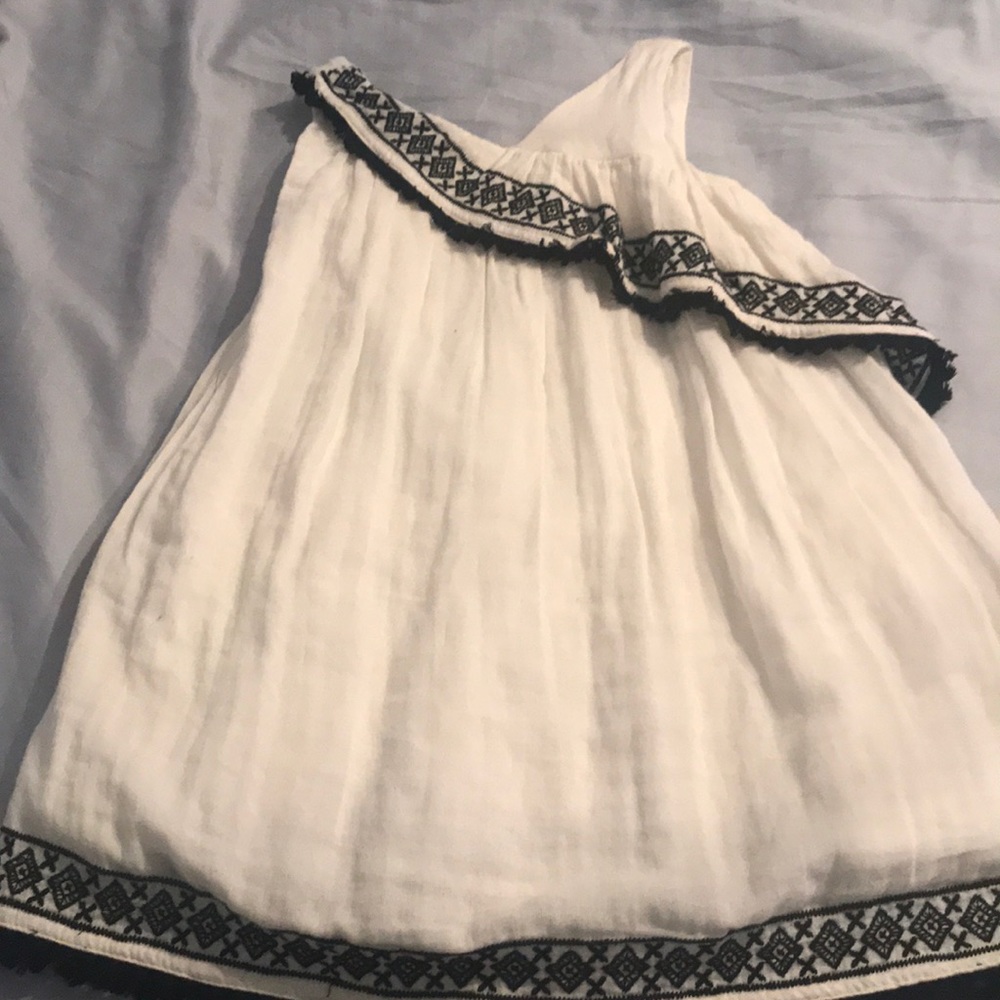 White dress with black embroidery